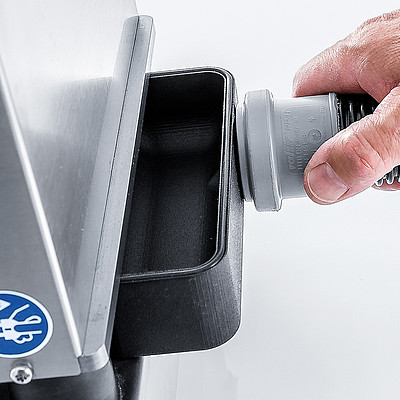 Dirt tray with suction socket